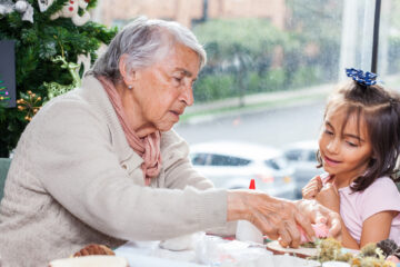 Child with elderly person. Image: Shutterstock.